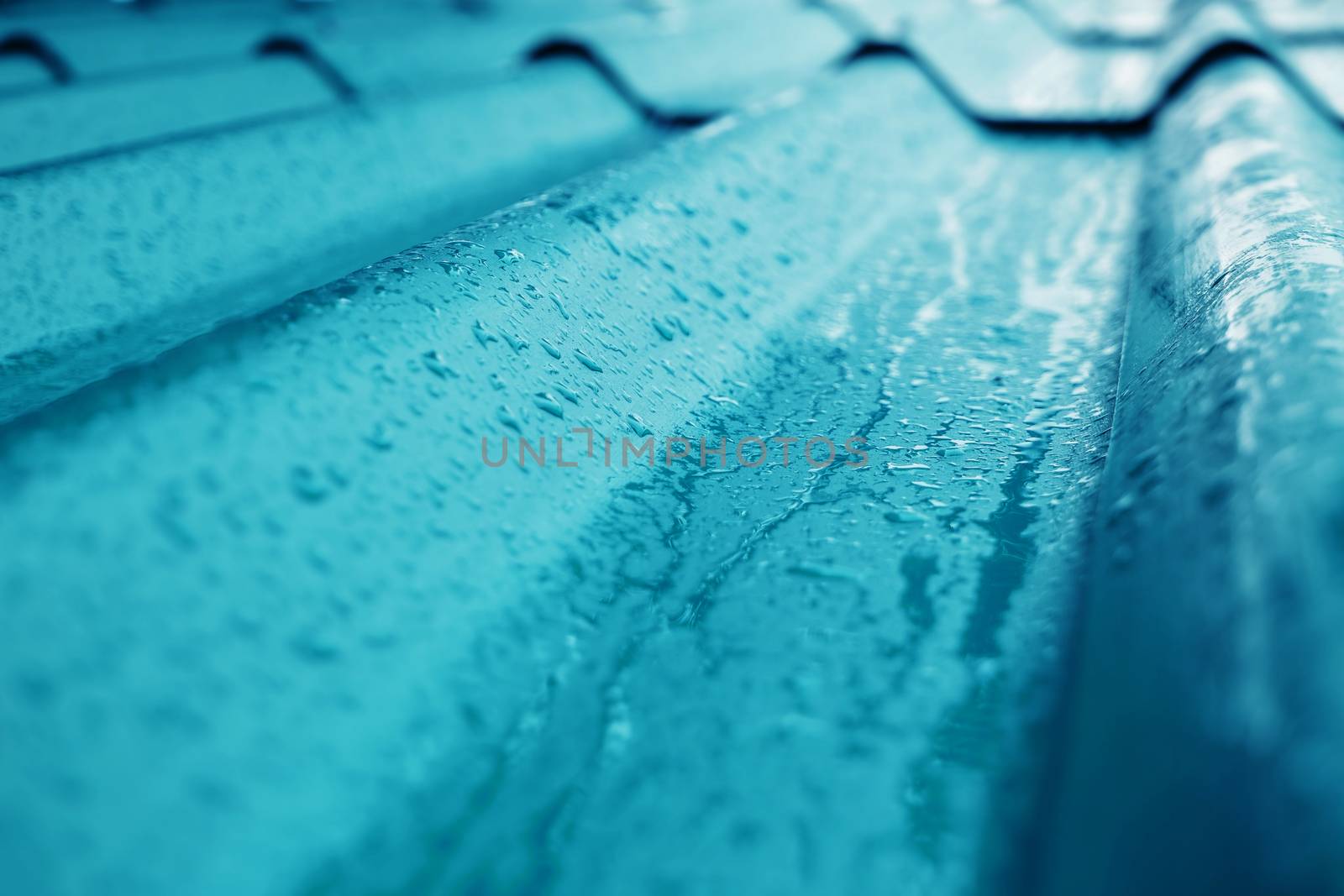 Closeup of Blue Roof Texture. Shot on Rainy Day or after stopped Rain. Selective focus