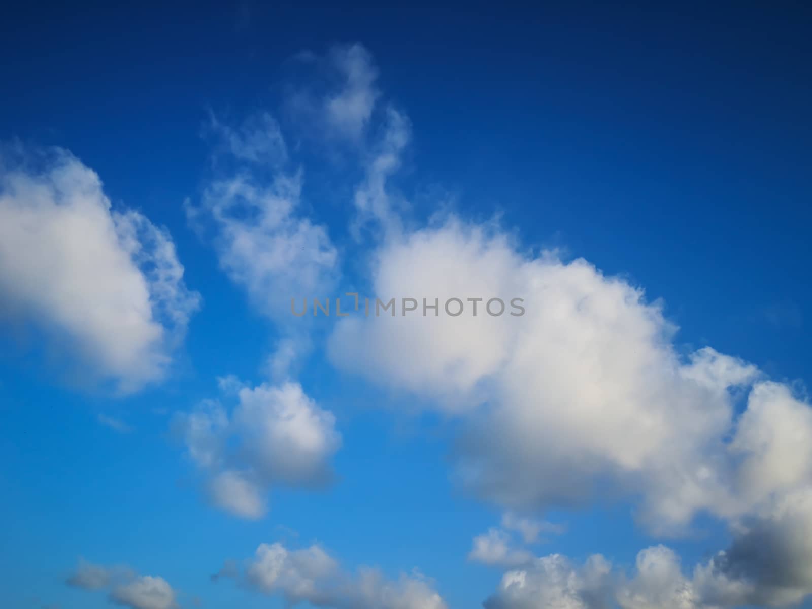 Blue sky with tiny clouds background. by feelartfeelant