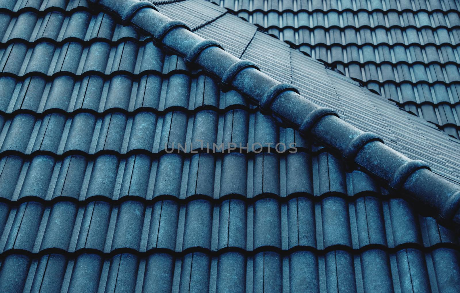 Wet Blue Tiles Roof Pattern. Shot on Rainy Day. Details of Architecture Concept