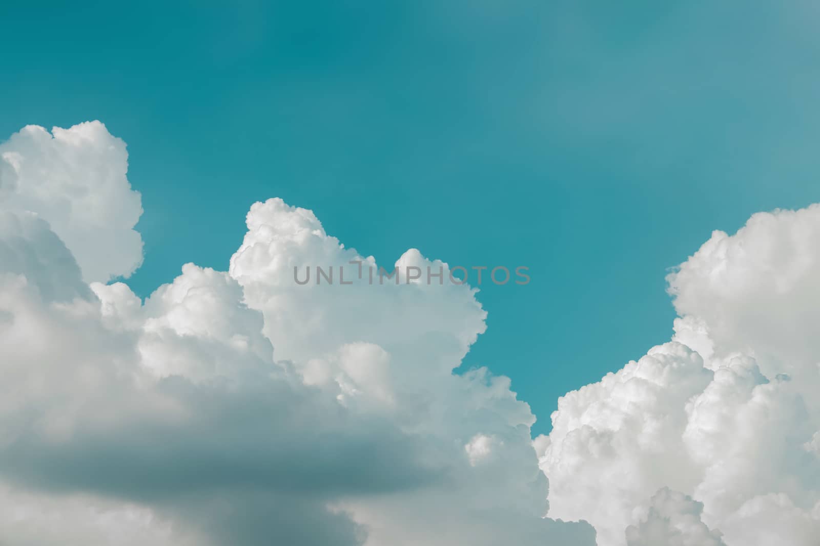 Blue Sky with White Puffy Cloud. Surrealistic Color, Vintage Ton by Black-Salmon