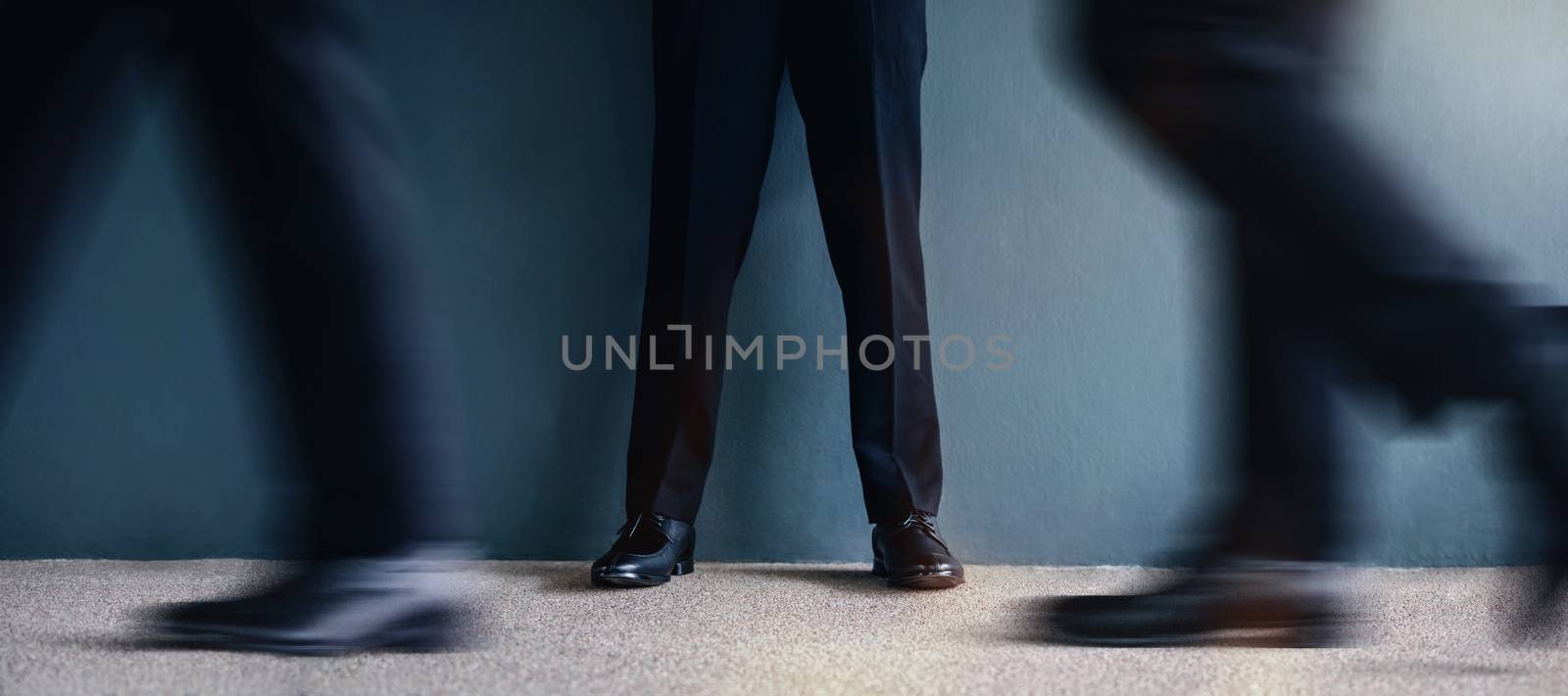 Urban Cool Businessman Standing by the Wall in Confident Posture by Black-Salmon