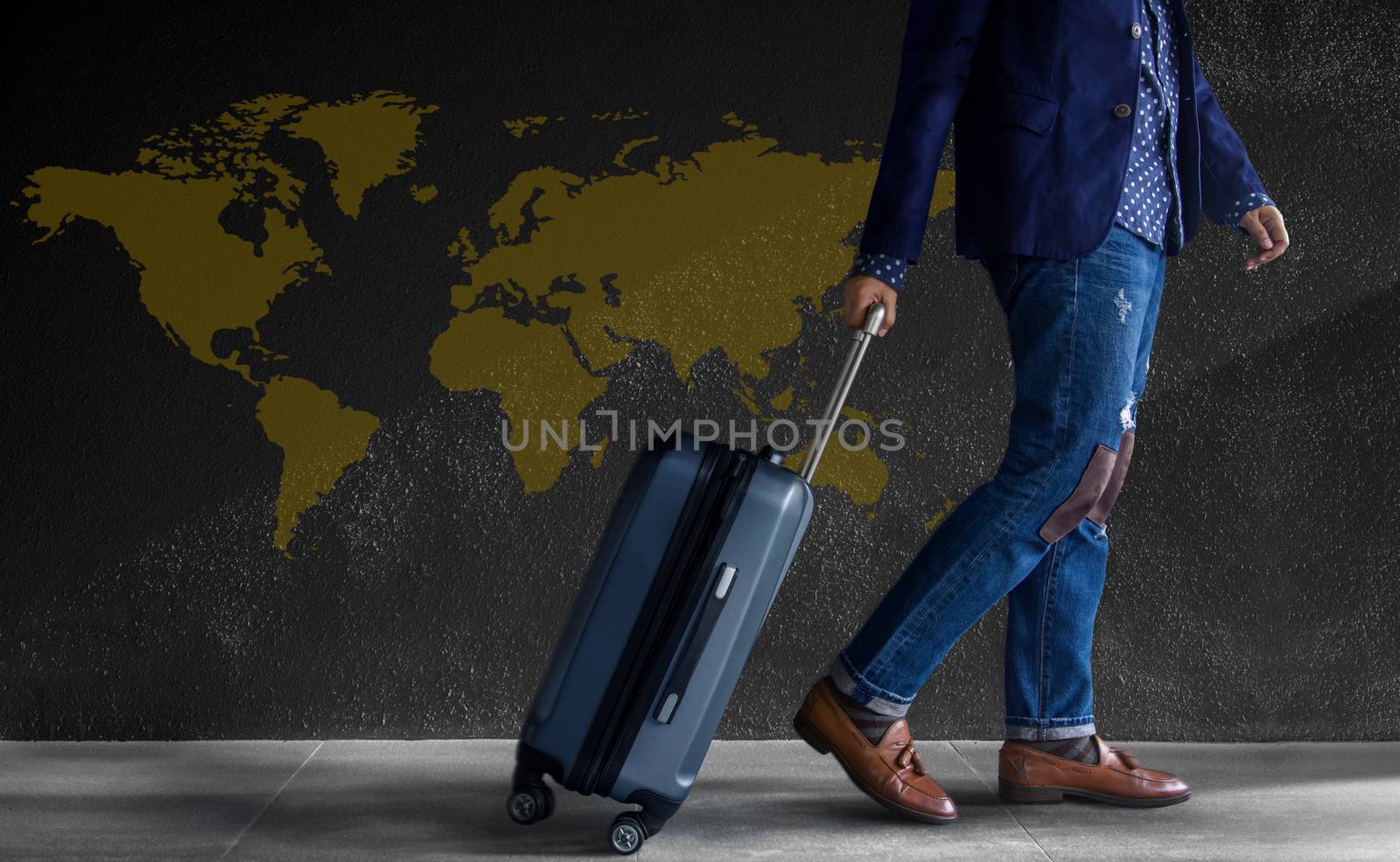 Travel Concept. Young Person with Luggage Walking by the Wall. W by Black-Salmon