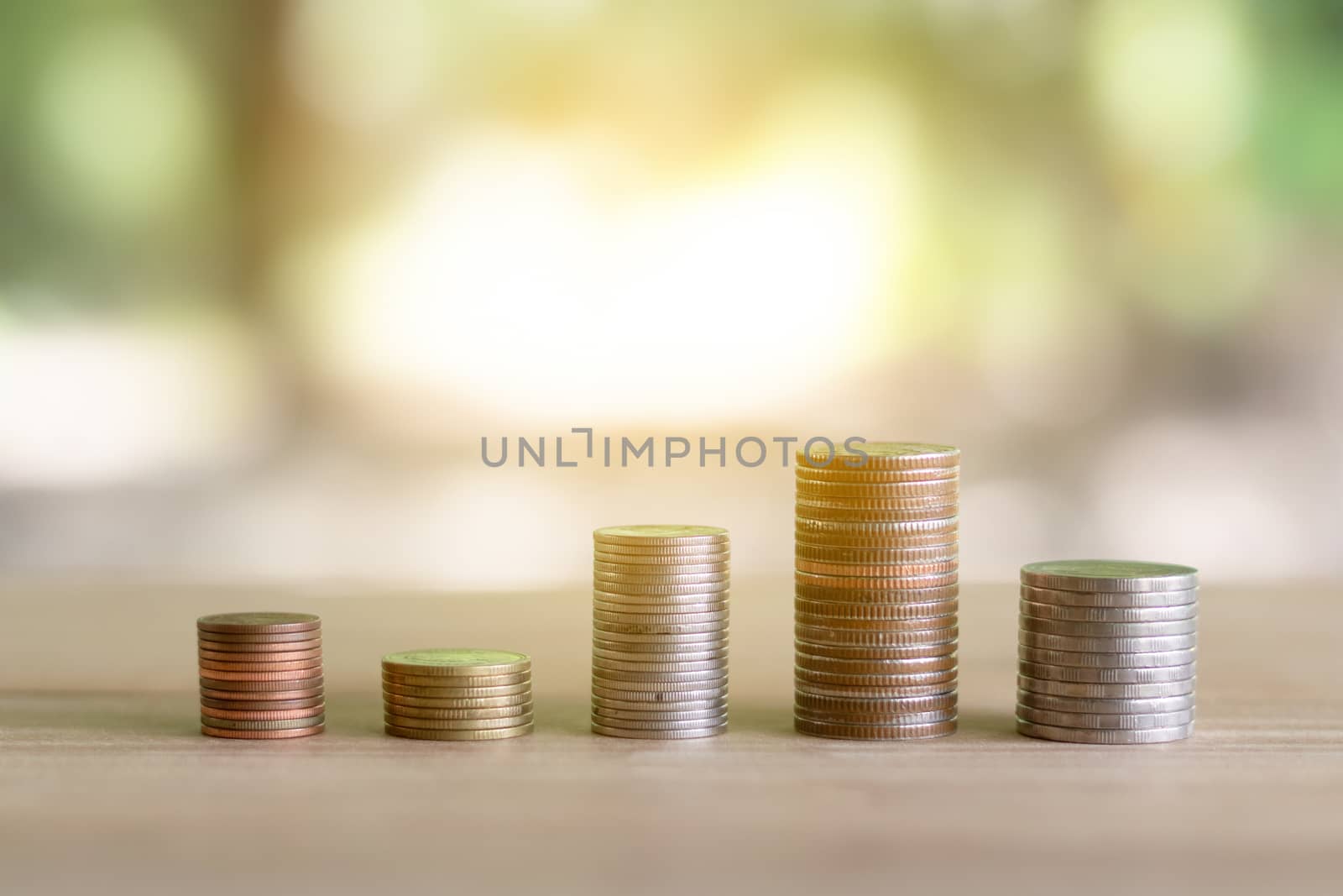 Coins stack of coins saving money and income or investment ideas and financial management for the future.