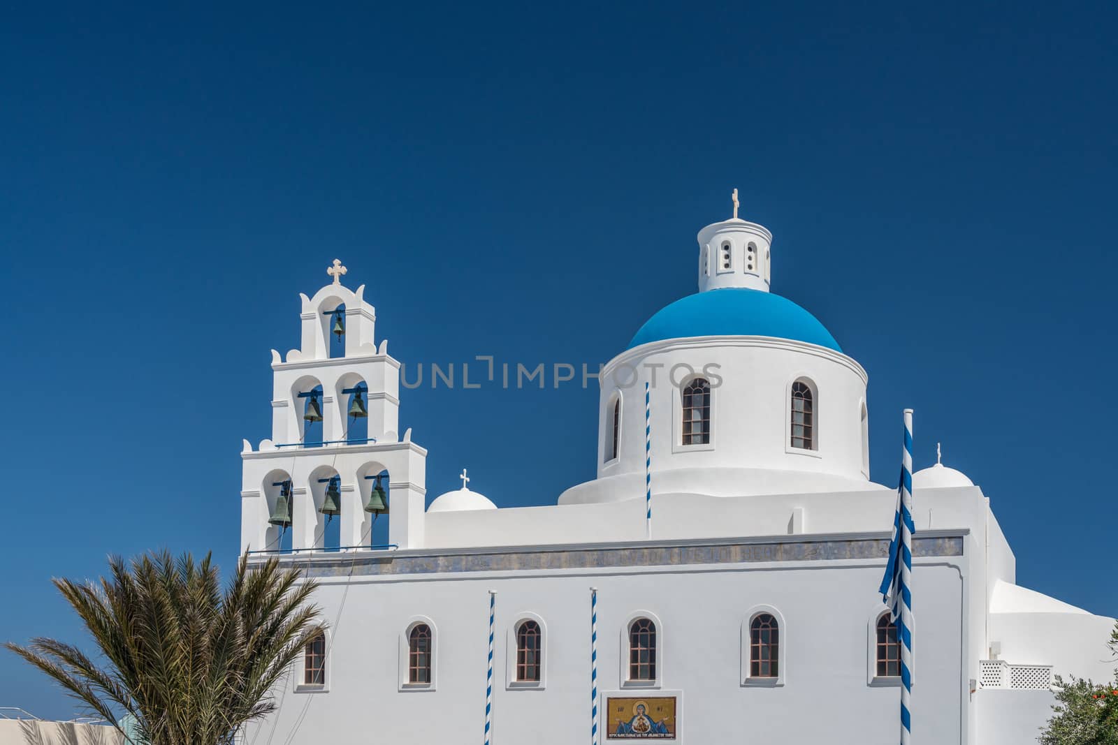 Traditional Greek Orthodox church in village of Oia on Santorini