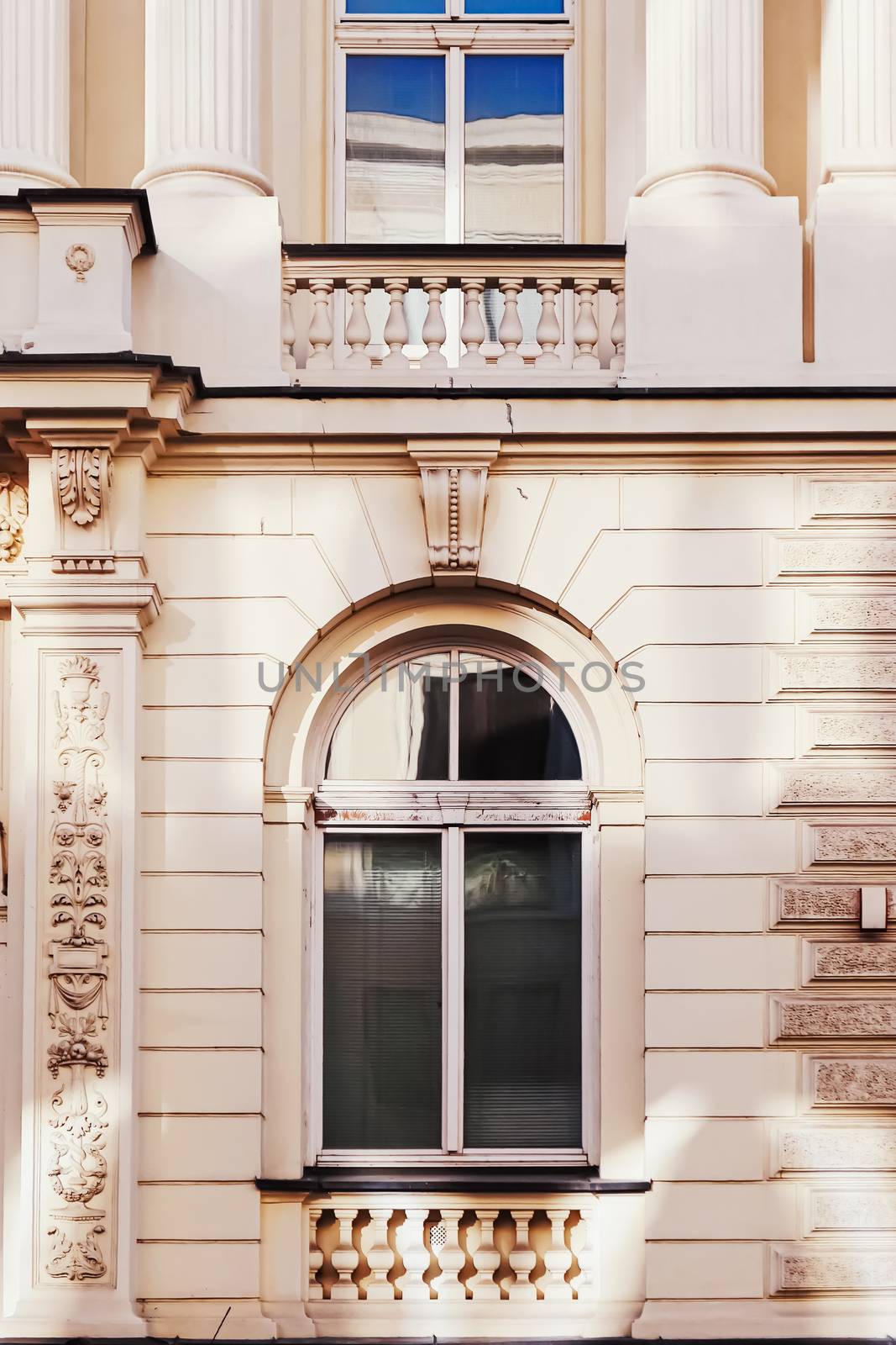 Exterior facade of classic building in the European city, architecture and design by Anneleven