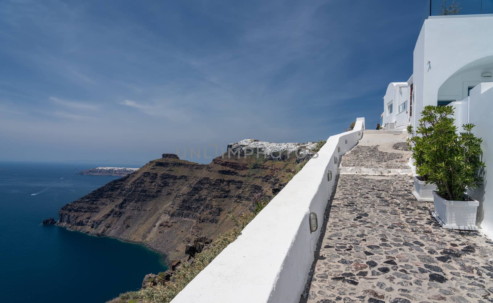 Pathway on cliff to Imerovigli and Firostefani above village of Fira on Santorini
