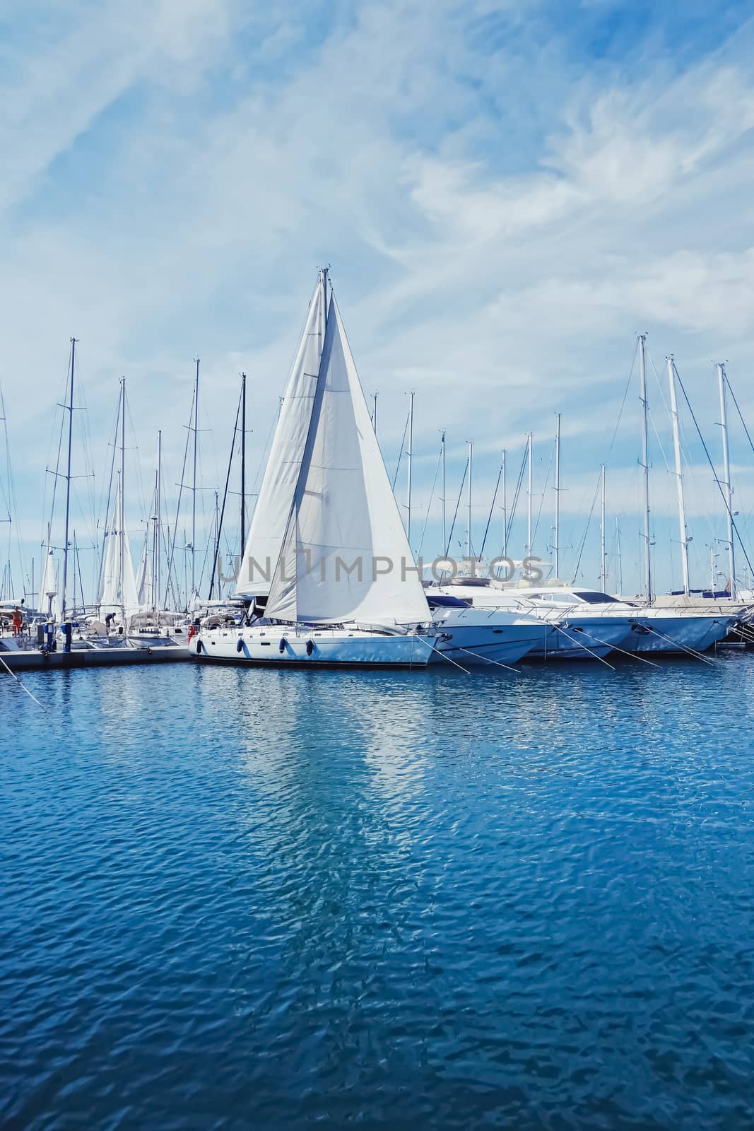 Yachts and boats in the harbor on Mediterranean sea coast, travel and leisure scene