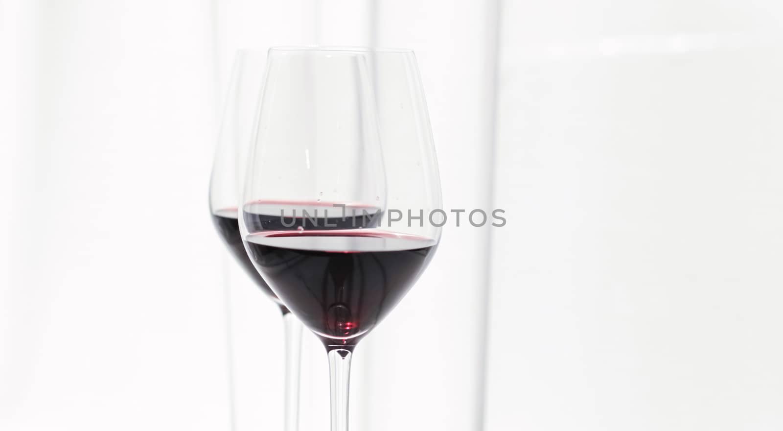 Two glasses of red wine, organic beverage product by Anneleven