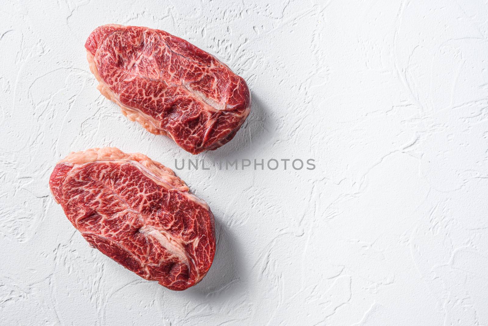 Australia wagyu oyster top blade steak on white background top view space for text.