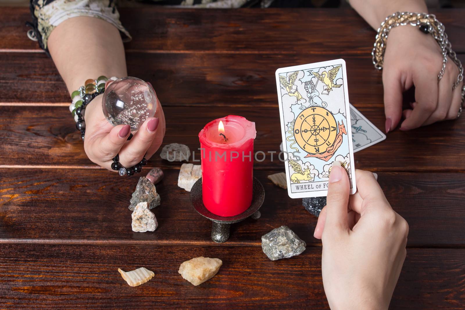 Bangkok,Thailand,March.15.20.The Gypsy lays out Tarot cards and  by YevgeniySam