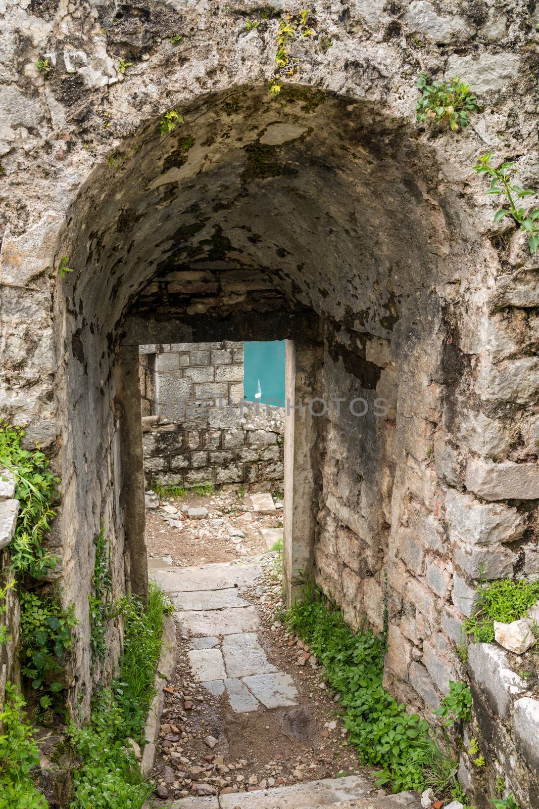 Stone walls of Kotor Fortress above the old town in Montenegro