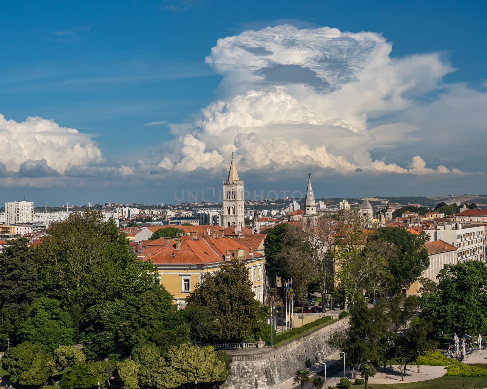 Ancient buildings and tower in the old town by the port of Zadar in Croatia