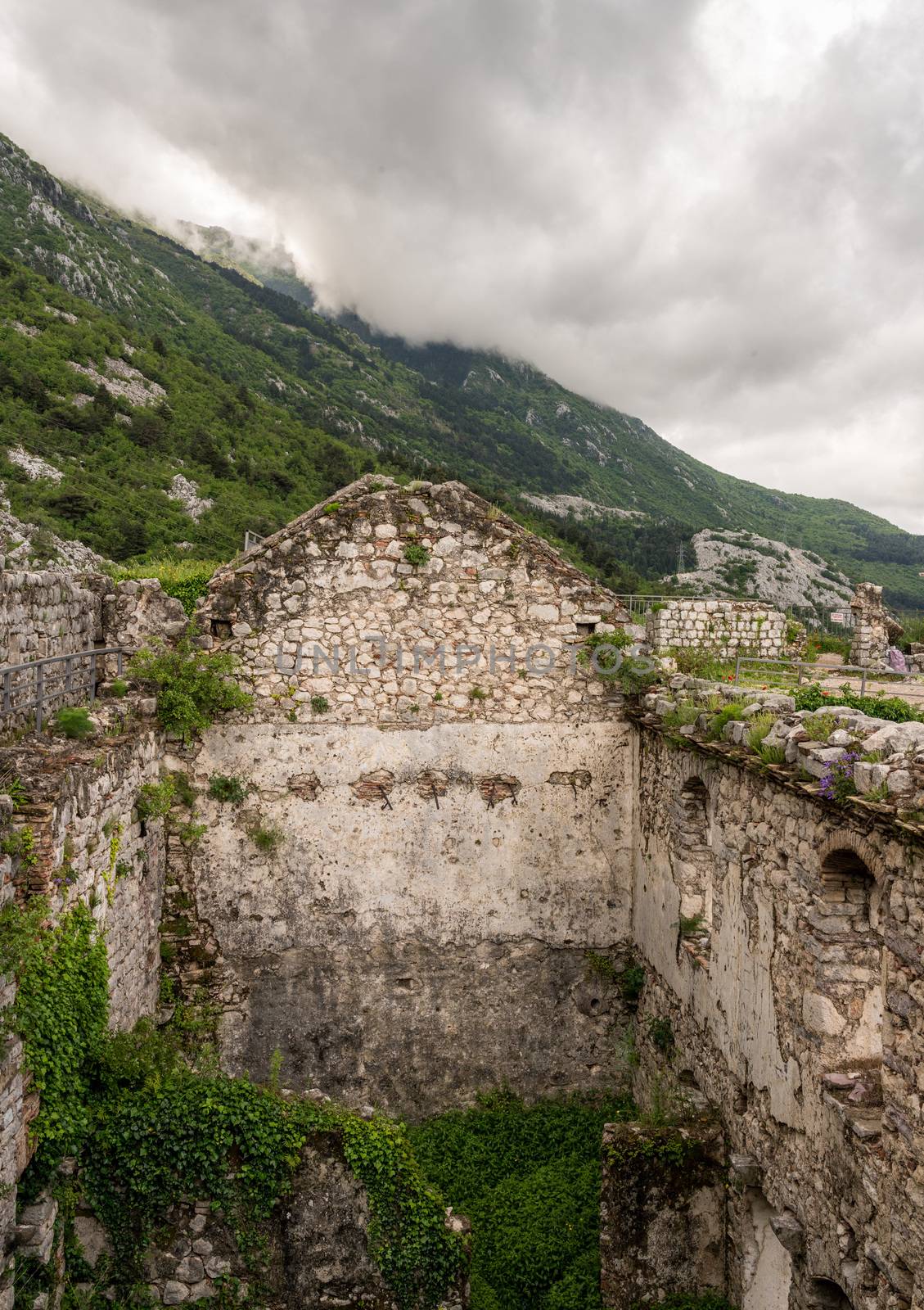 Kotor Fortress on mountainside above old town in Montenegro by steheap
