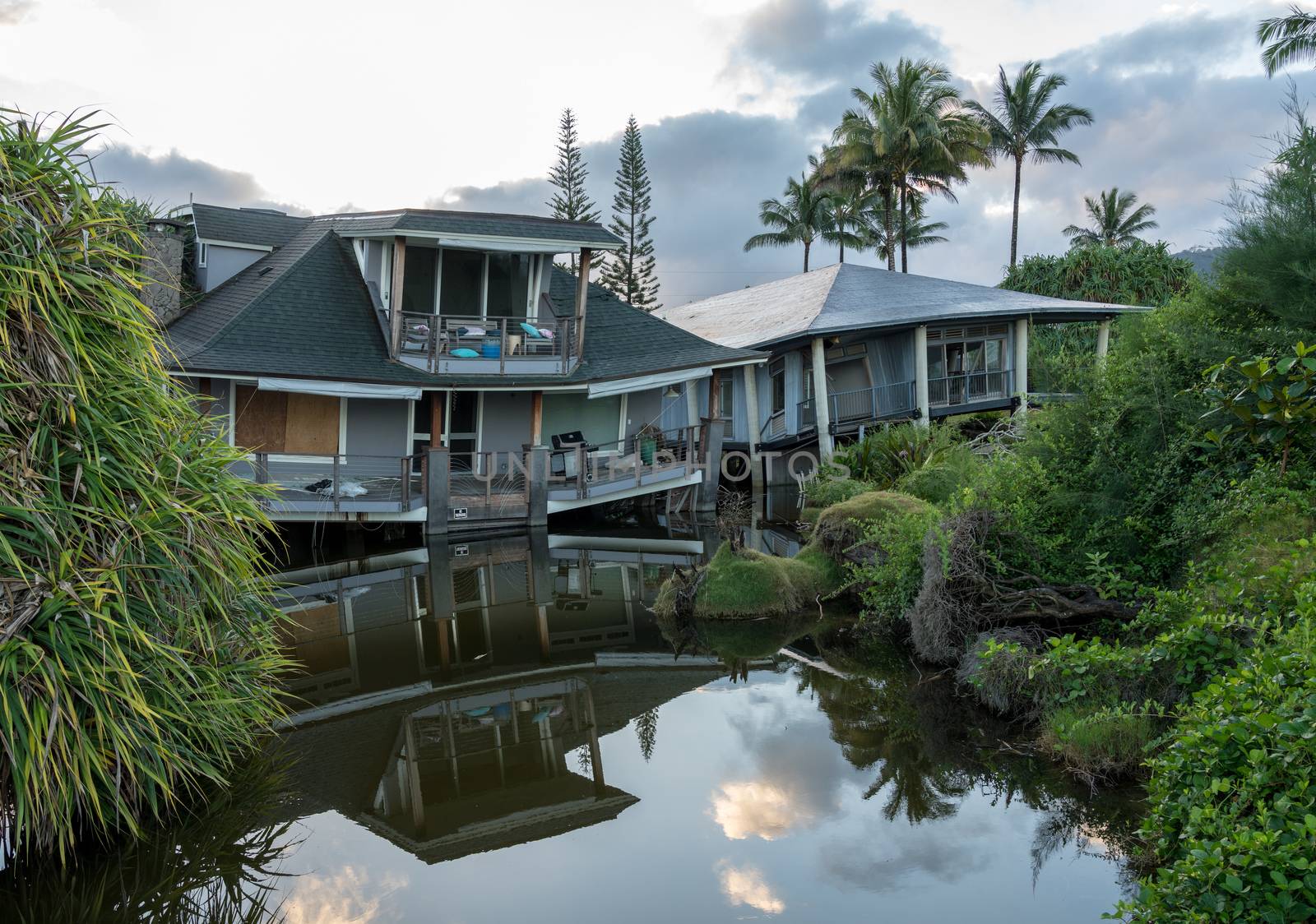 Two beach homes sinking into sink hole after the massive rain storms of April 2018 on Kauai