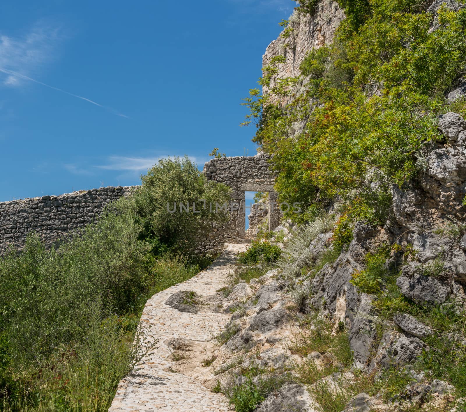 Steps leading to ruins of old Venetian fort above the coastal town of Novigrad in Croatia