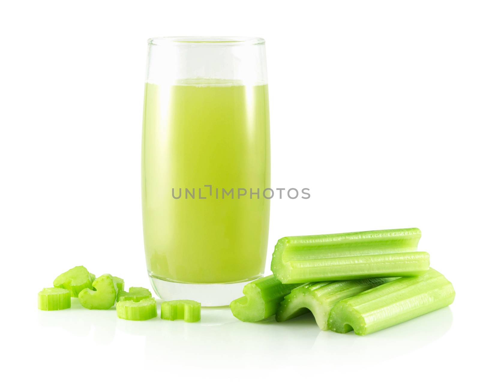 Glass of fresh celery juice isolated on white background, food for health