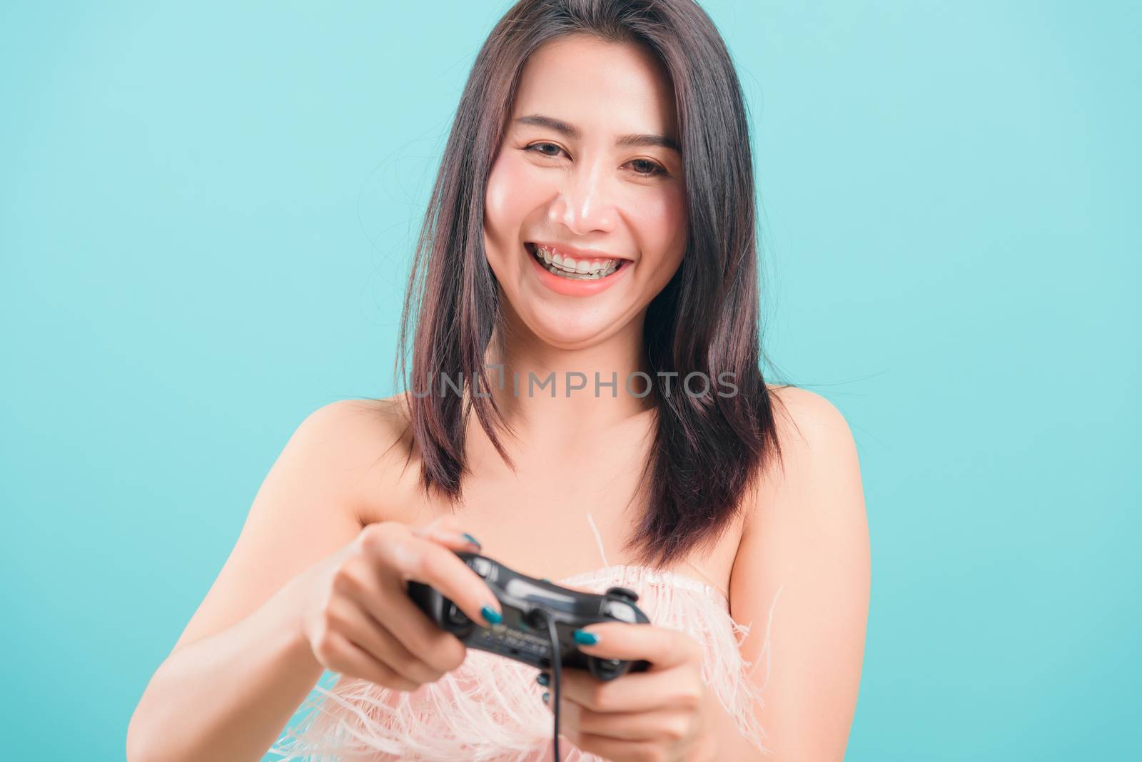 woman standing smile lifestyle games technology her holding joys by Sorapop