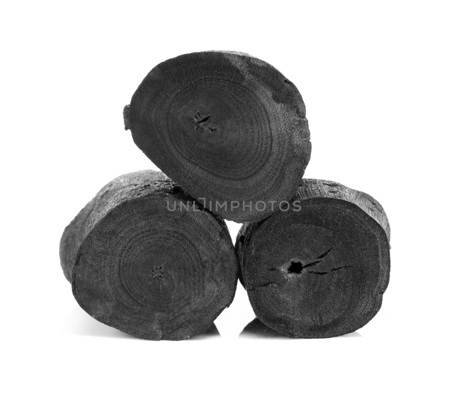 Natural black charcoal isolated on white background
