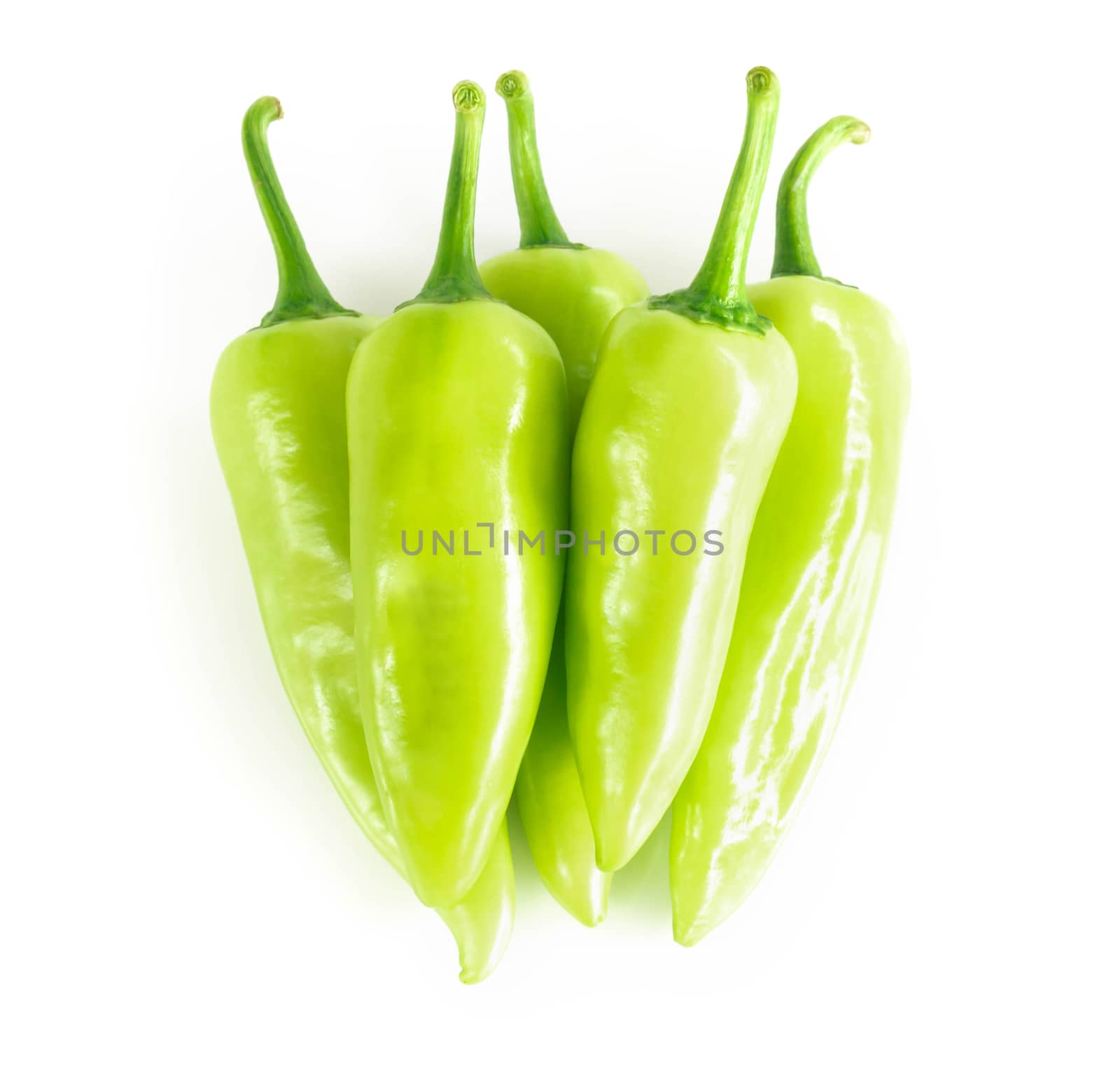 Close up top view green chilli pepper on white background, raw food ingredient concept