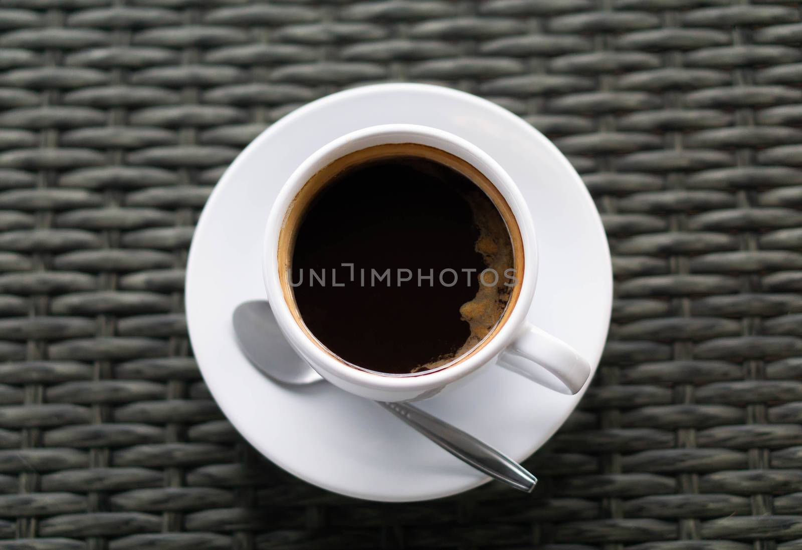 Closeup top view hot americano coffee on wood table 