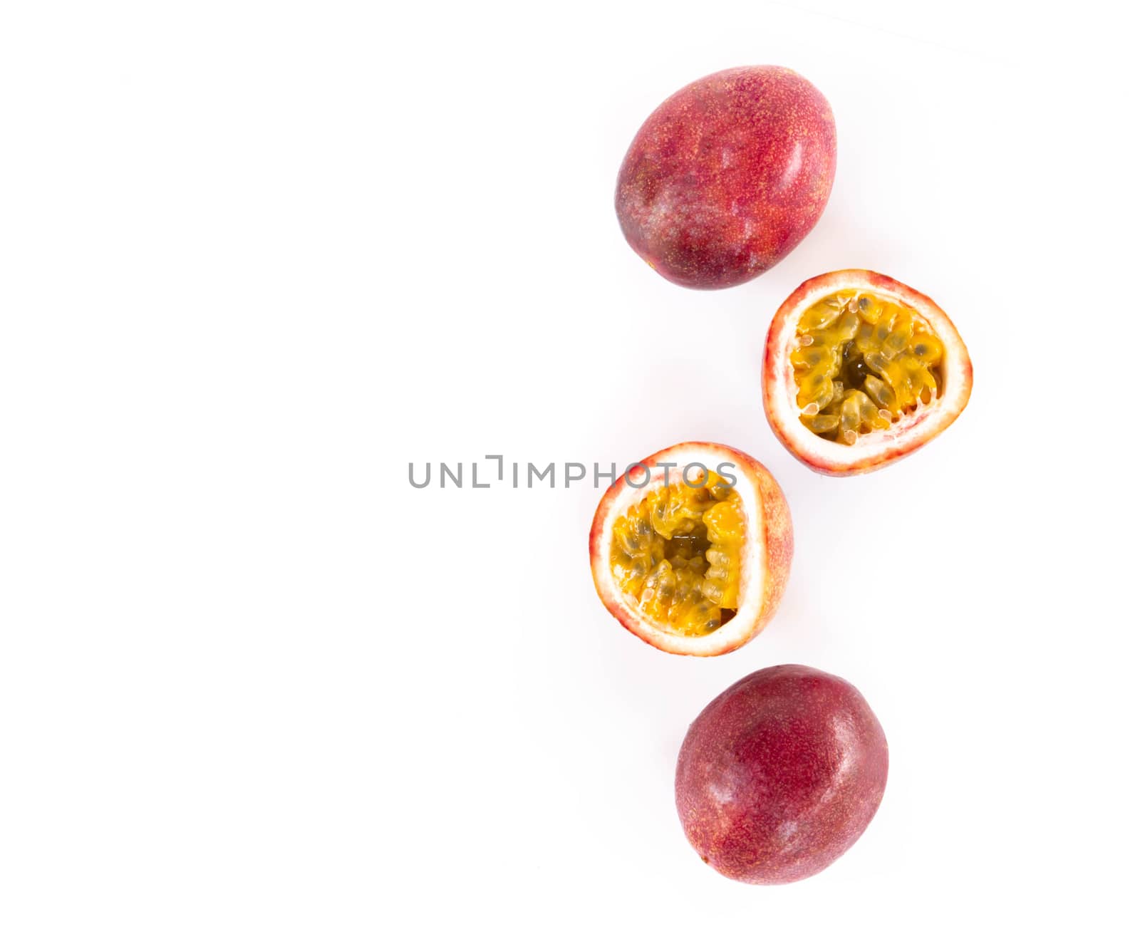 Closeup top view passion fruit with seed and haft  on white background, fruit for healthy concept