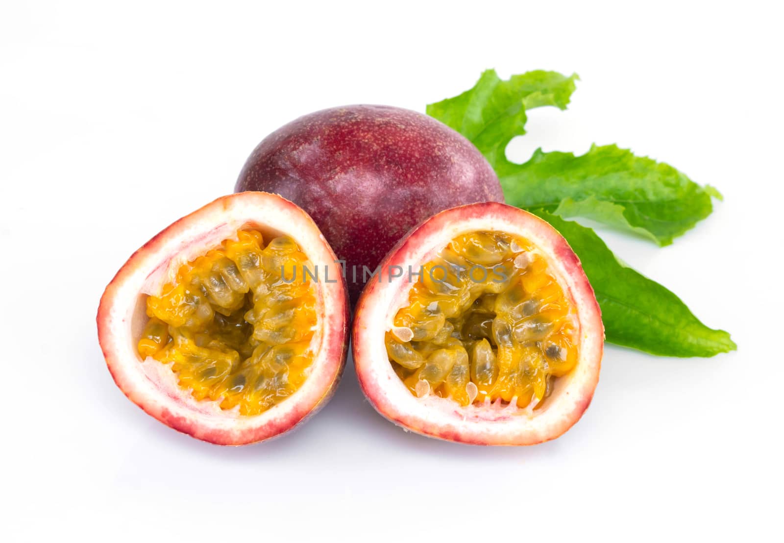 Passion fruit with green leaf isolated on white background, fruit for healthy concept