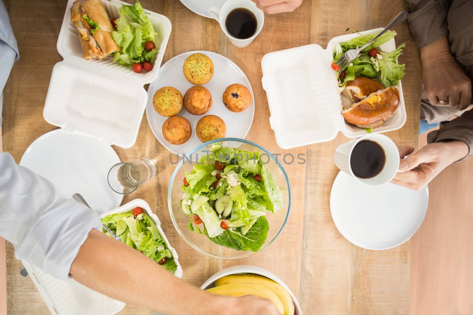 Business people having lunch together by Wavebreakmedia