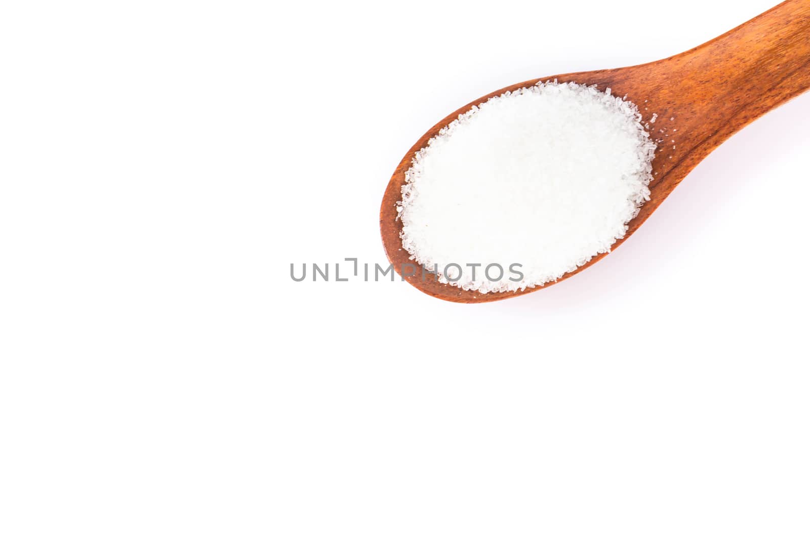 Monosodium glutamate in wood spoon on white background, food ingredient