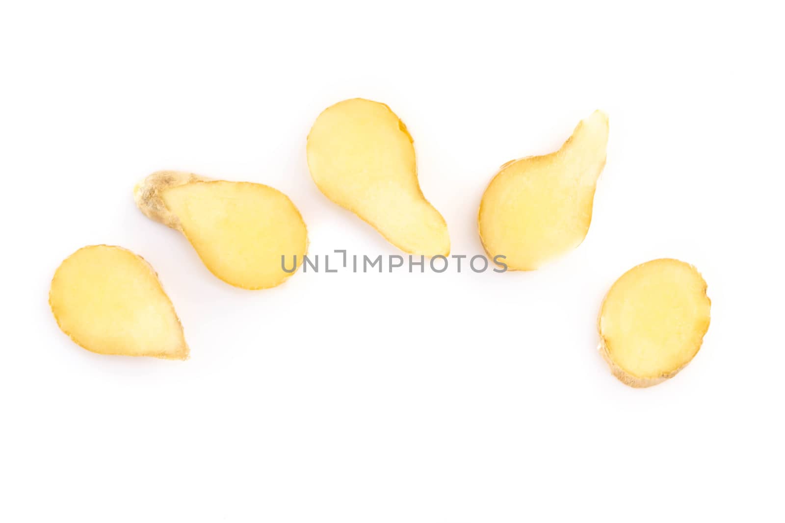 Fresh ginger root sliced on white background for herb and medica by pt.pongsak@gmail.com