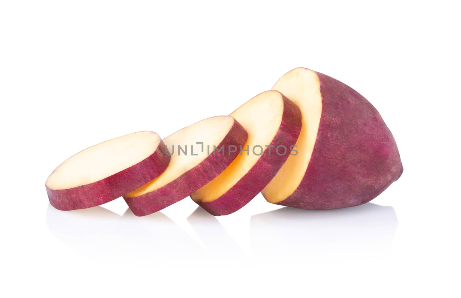 Raw sweet potato with slices isolated on white background, healthy food concept