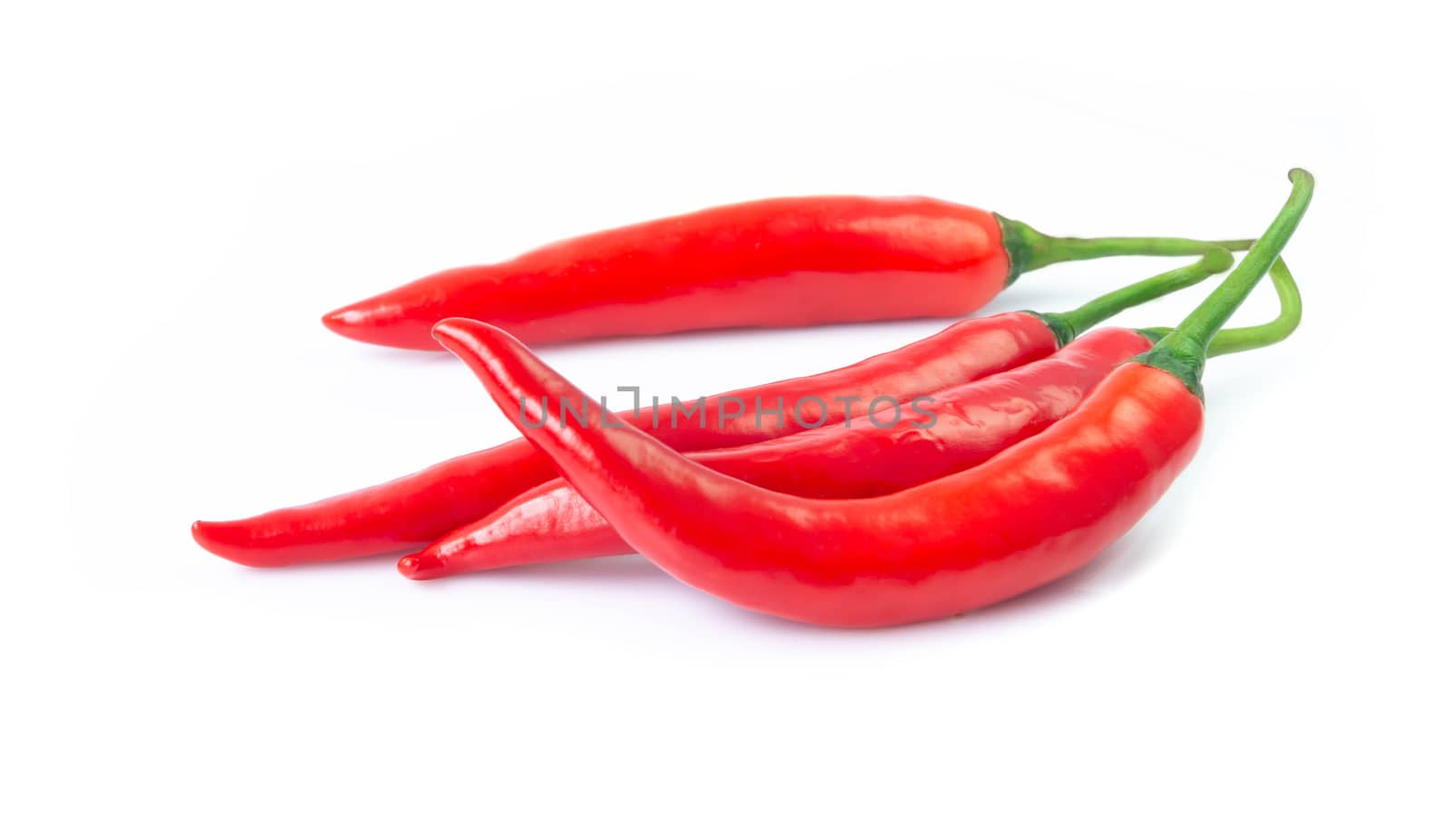 Closeup red chili pepper with sliced on white background, raw food ingredient concept