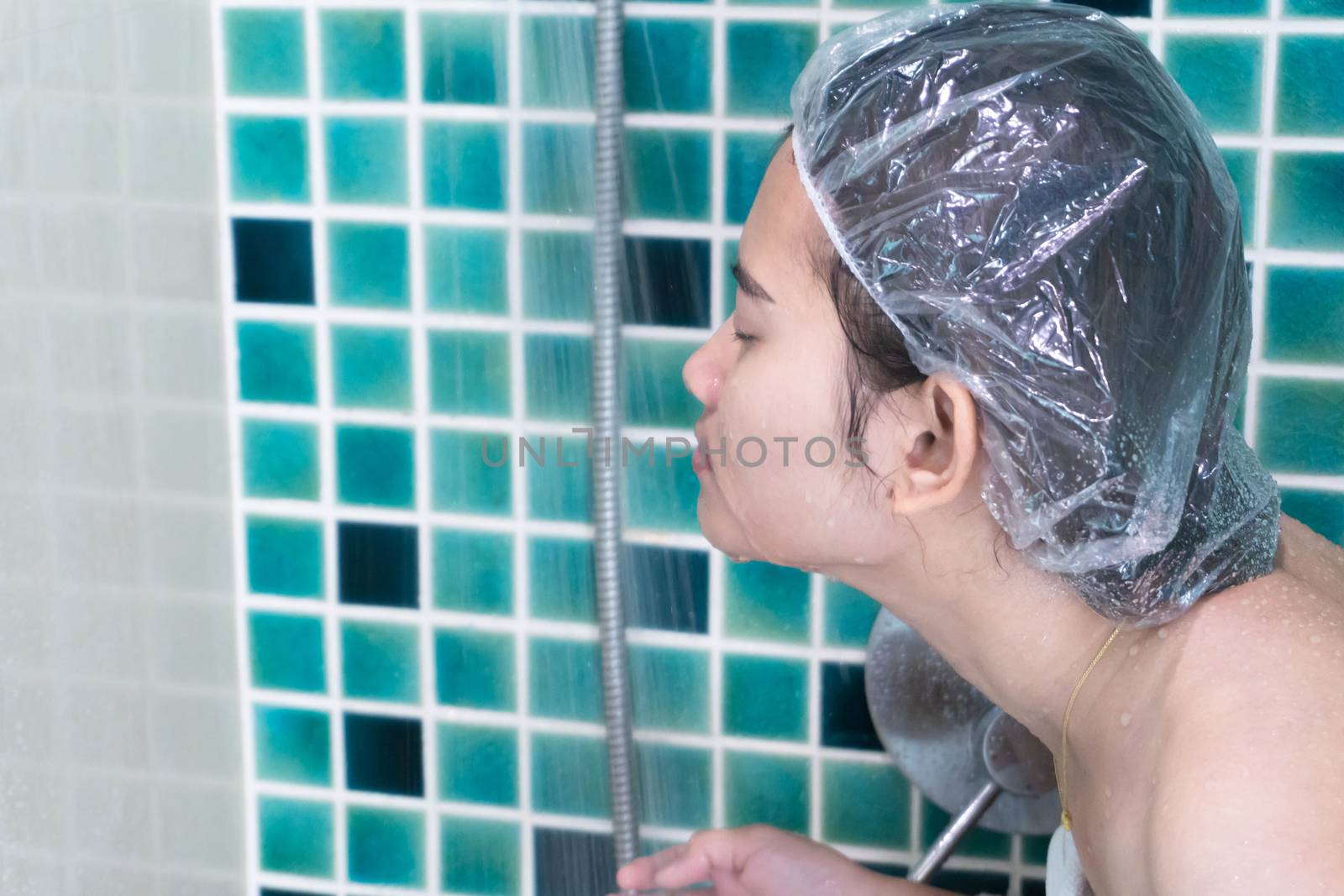 Closeup woman face wash in bathroom, health care and beauty concept, selective focus