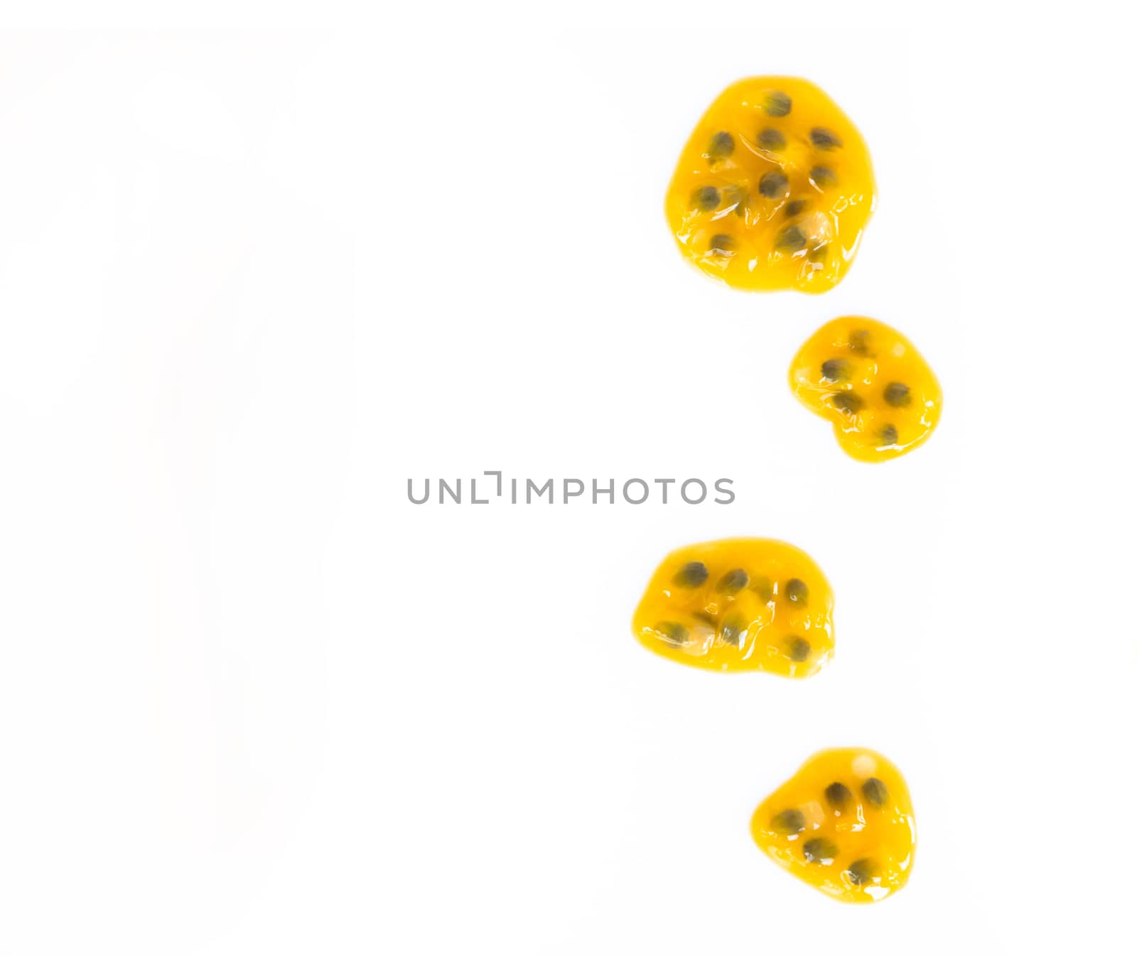 Closeup top view passion fruit seed on white background, fruit f by pt.pongsak@gmail.com