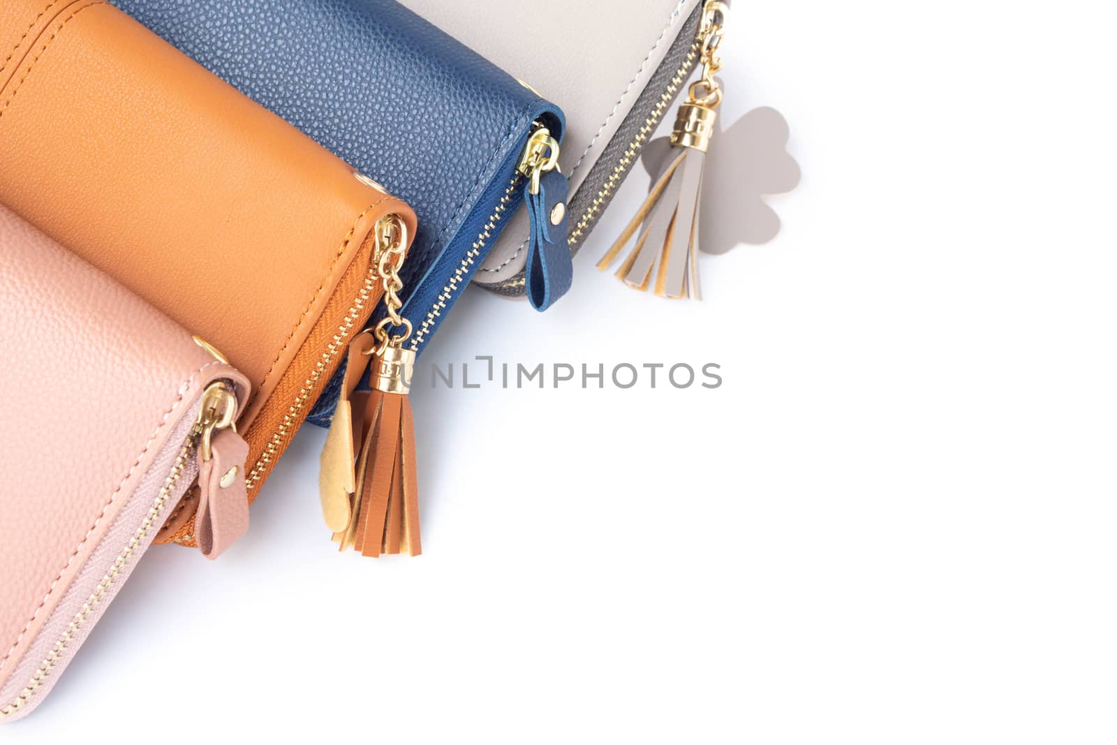 Closeup modern woman wallet fashion on white background with cop by pt.pongsak@gmail.com