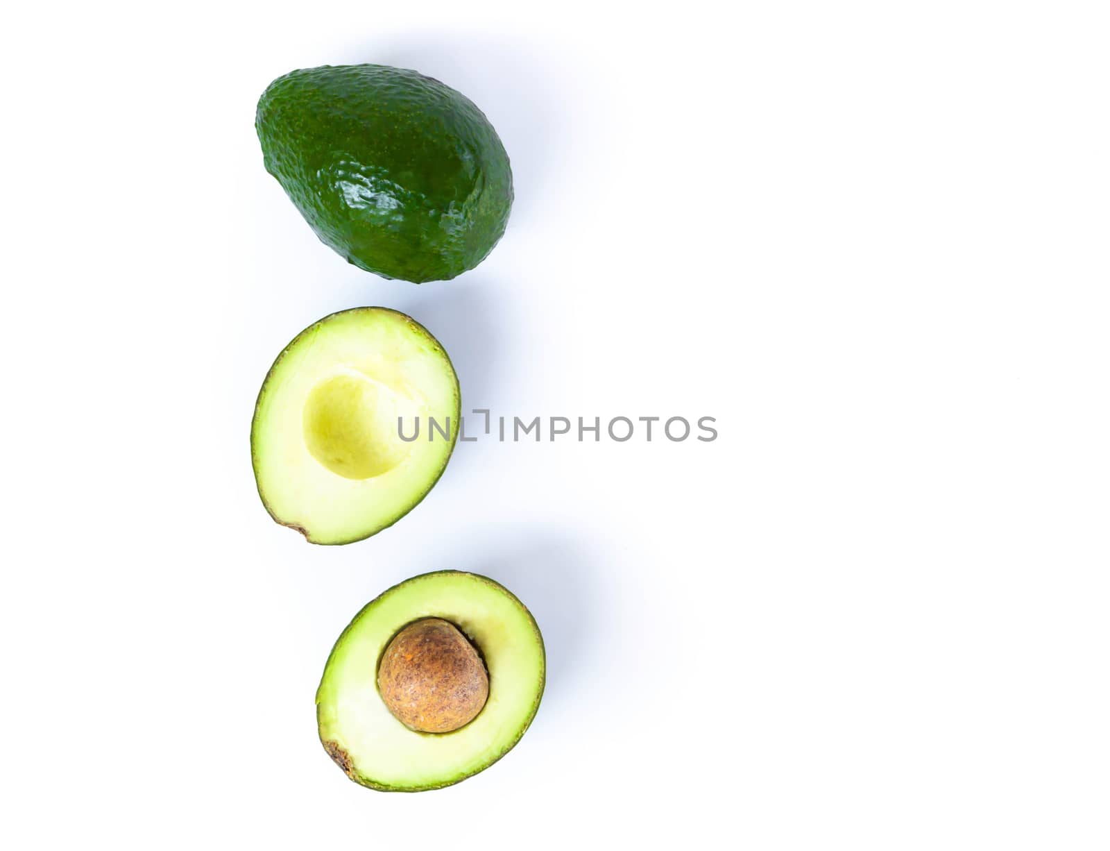 Top view fresh ripe avocado fruit isolated on white background with copy space, healthy food concept