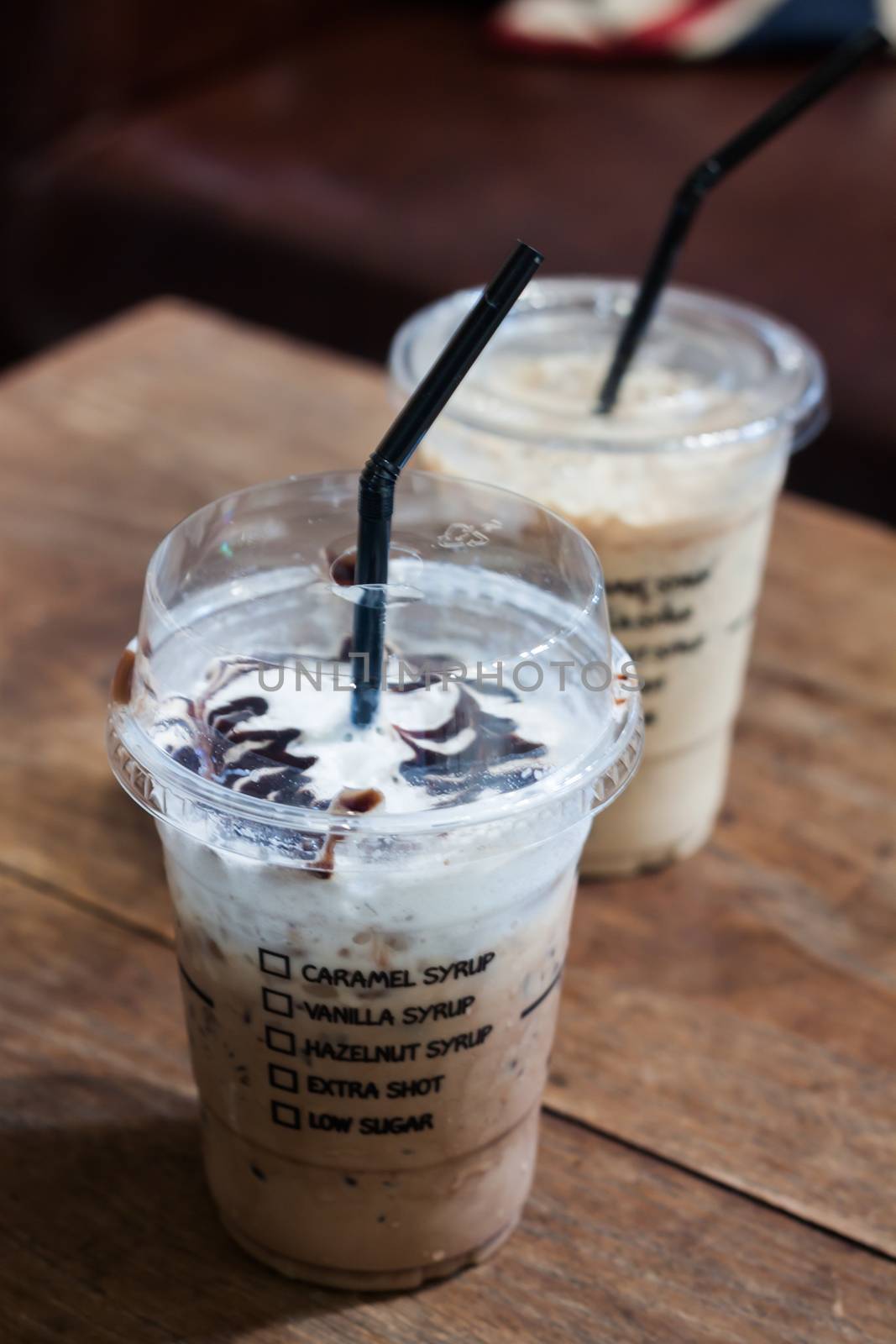 Iced coffee in coffee shop by punsayaporn