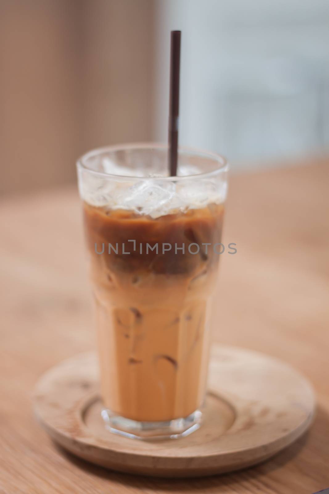 Iced coffee in coffee shop by punsayaporn