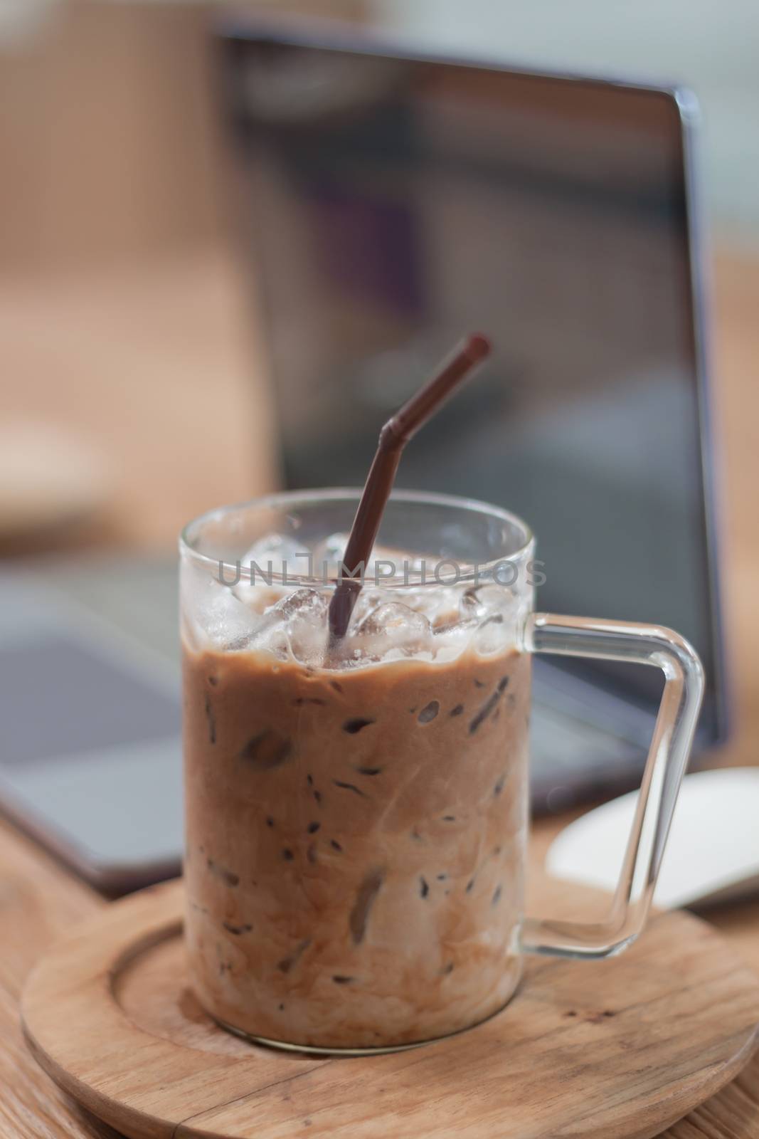 Iced coffee in coffee shop by punsayaporn