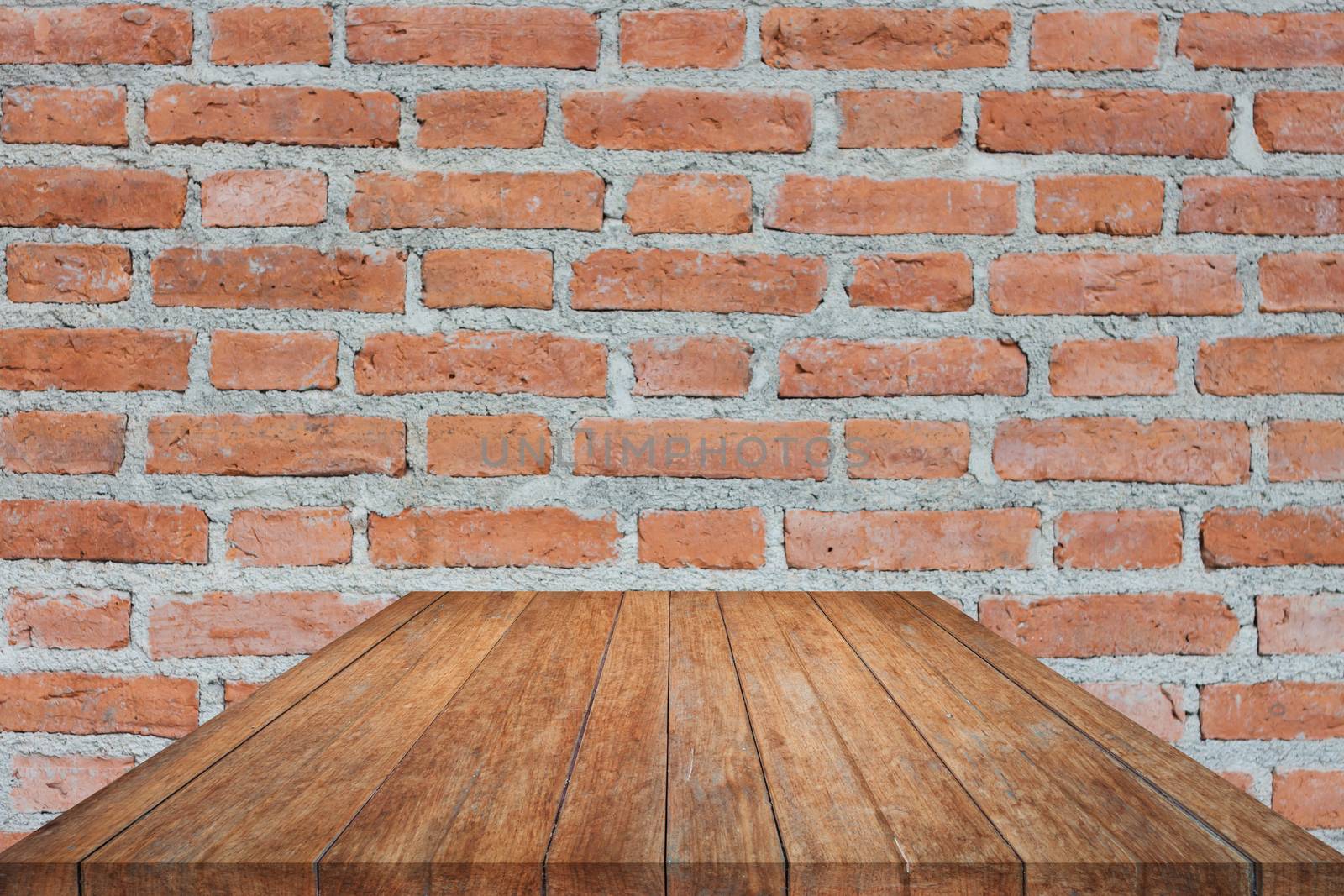 Perspective brown wooden on brick wall. product display template