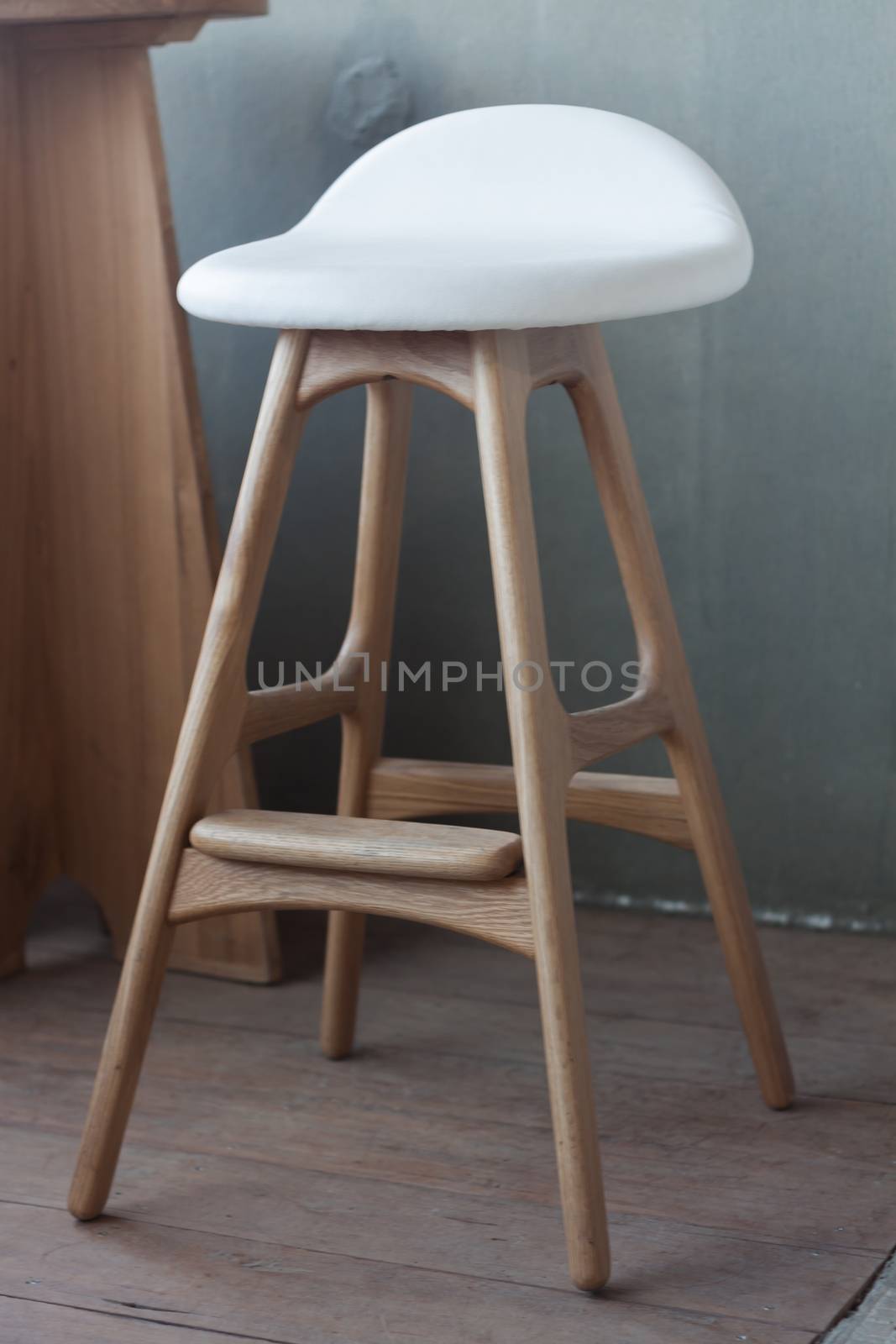 Elegant chairs with empty concrete background, stock photo