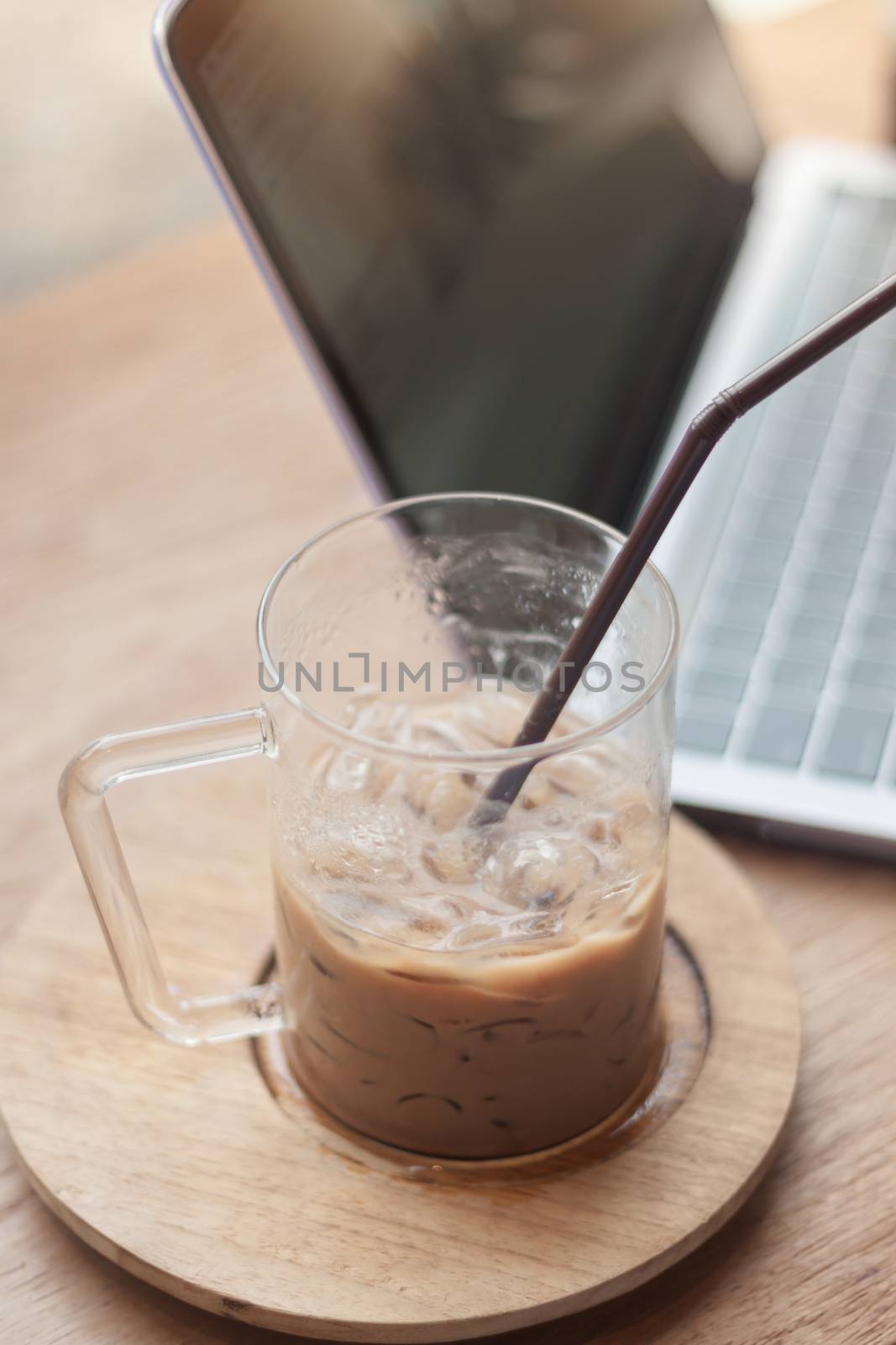 Iced coffee in coffee shop by punsayaporn