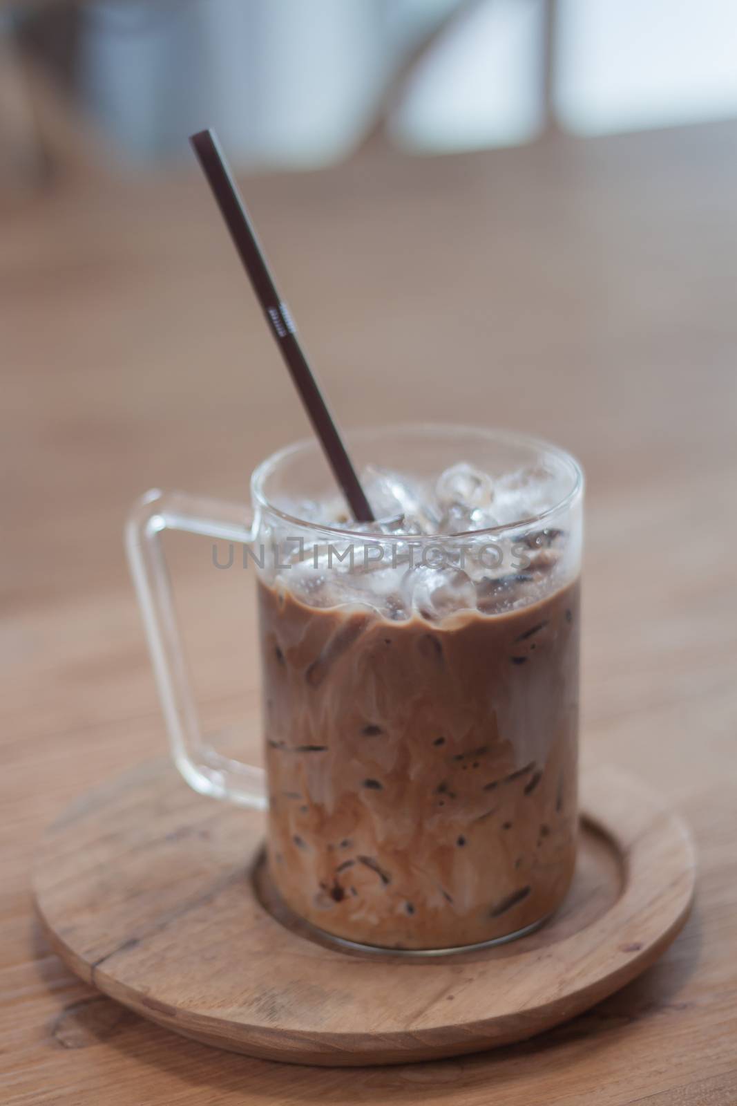 Iced coffee in coffee shop by punsayaporn