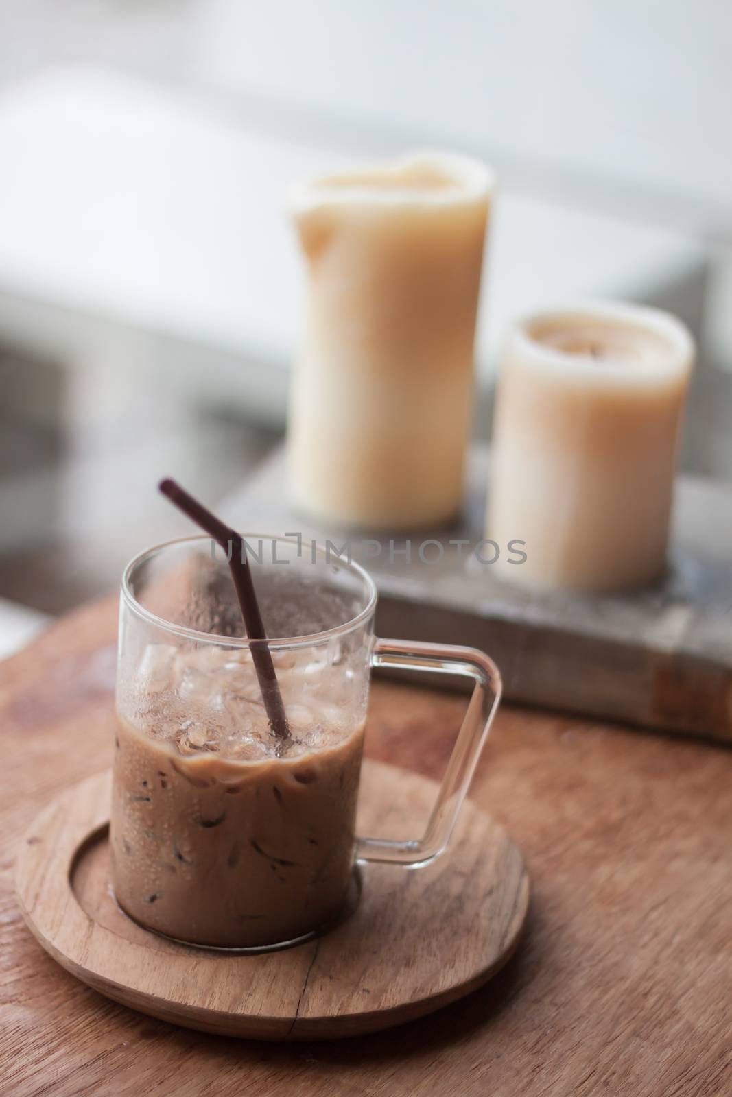 Iced coffee in coffee shop by punsayaporn