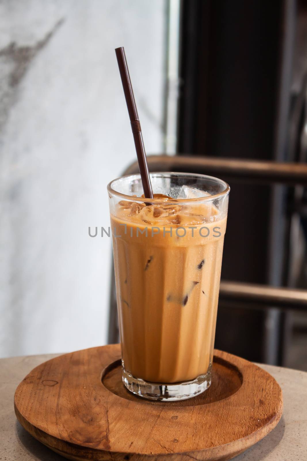 Iced coffee in coffee shop by punsayaporn