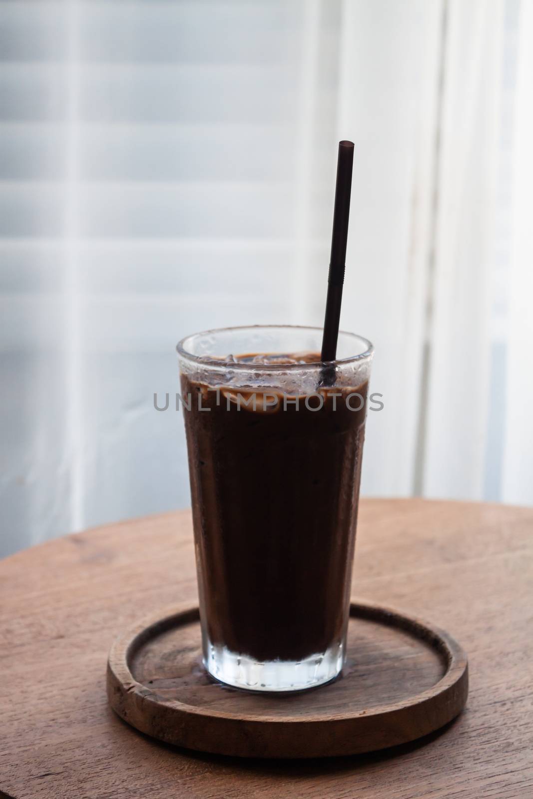 Iced coffee in coffee shop by punsayaporn