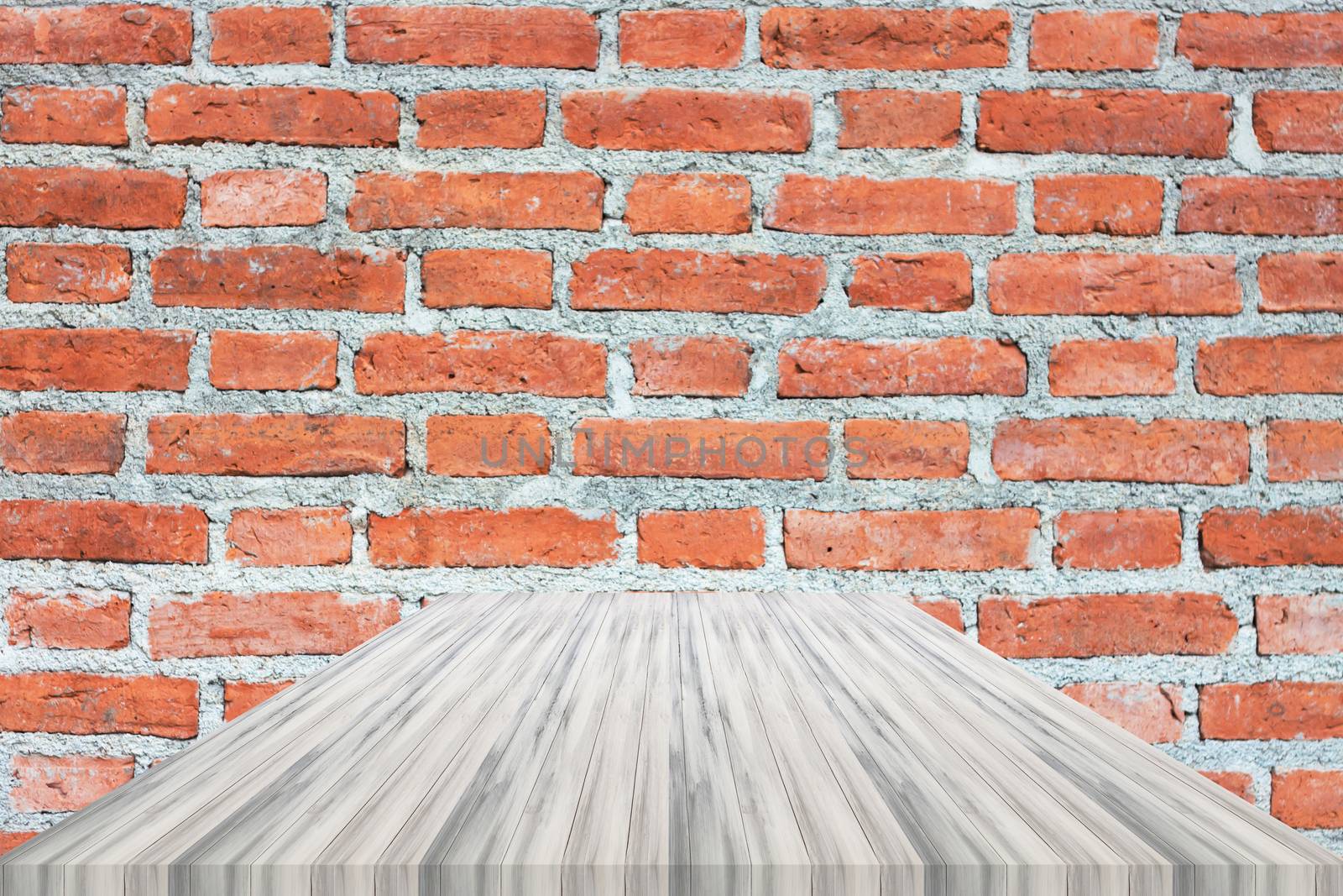 White table top on brick wall. For product display