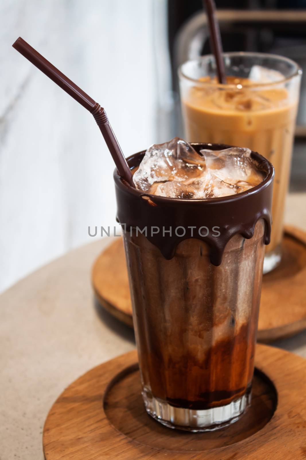 Iced coffee in coffee shop by punsayaporn