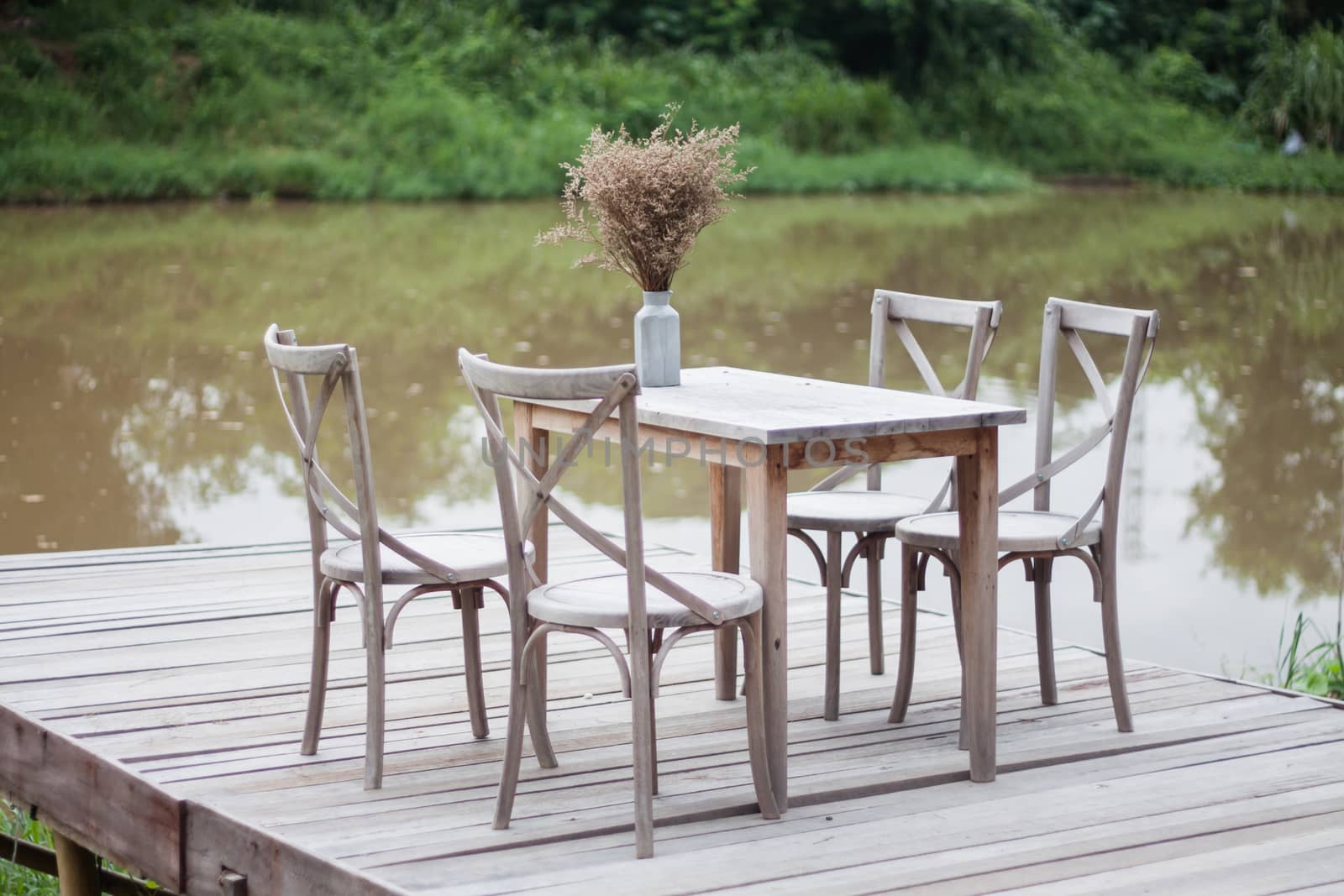 Wooden tables outside coffee shop, stock photo