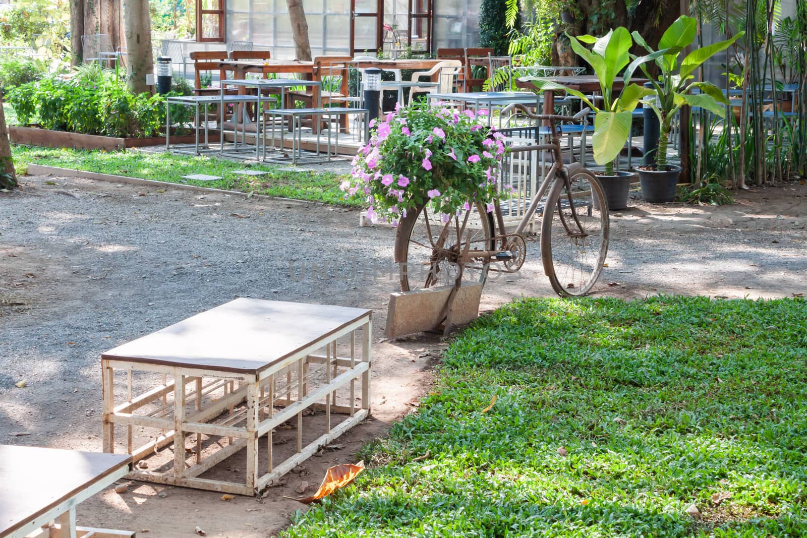 Garden decorated in coffee shop by punsayaporn