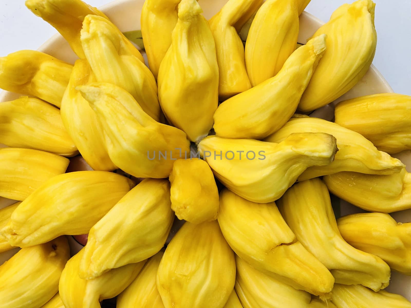 Beautiful view of Jack fruits kept in a plate for sale at market during the summer season